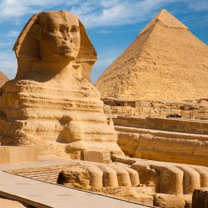 Great Sphinx with pyramids of Menkaure and Khafre in background, Giza, Egypt